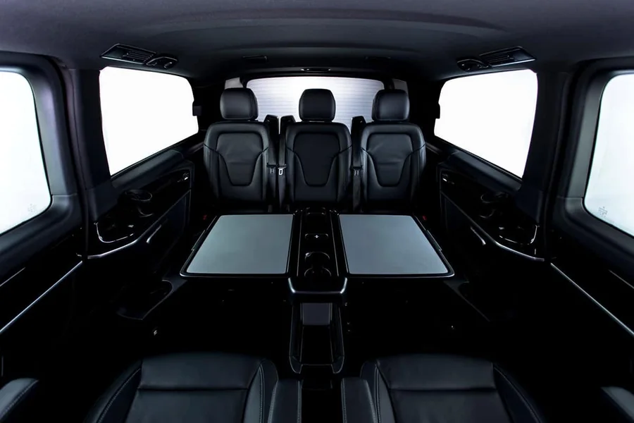 Interior of the Mercedes-Benz V-Class in face-to-face layout with the tables folded out