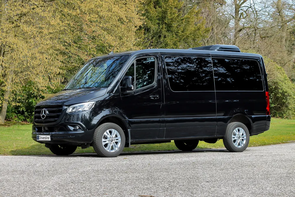 Black Mercedes-Benz VIP Sprinter, exterior view on site
